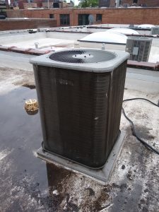 Clean central air conditioner outside