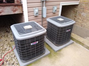 Central Air Conditioners outside of a multi-unit home